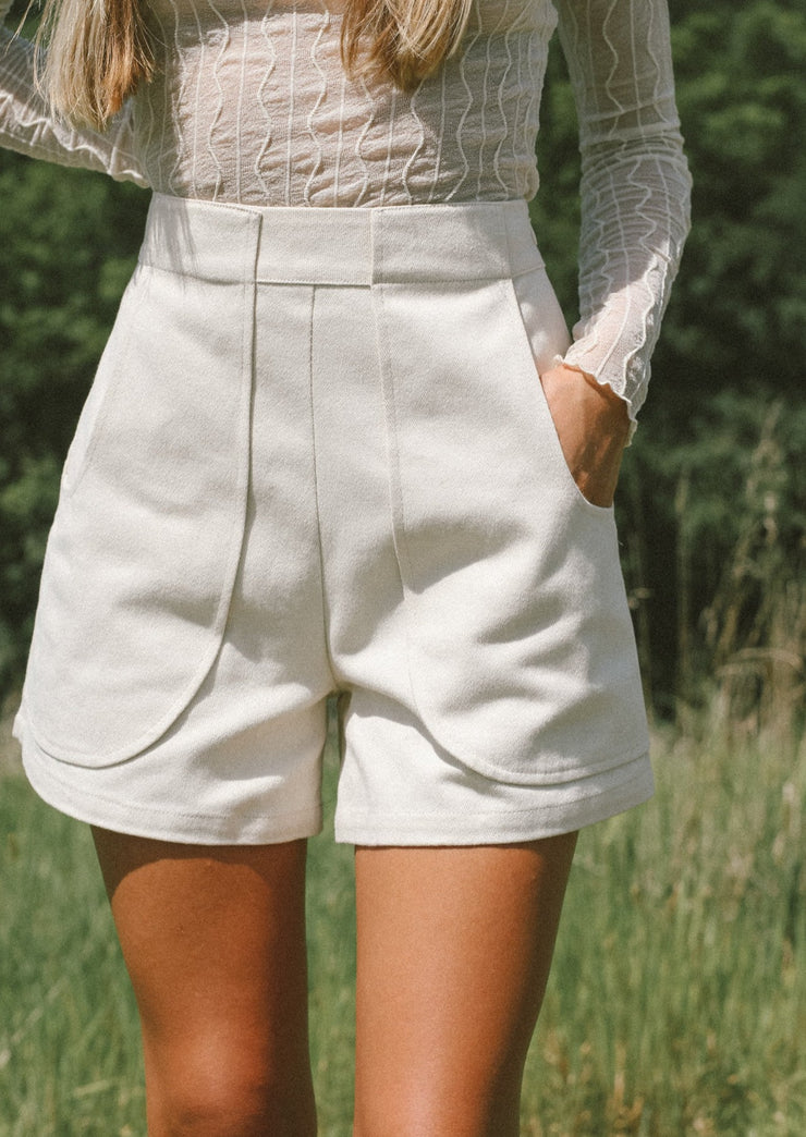 A Girl Wearing White shorts