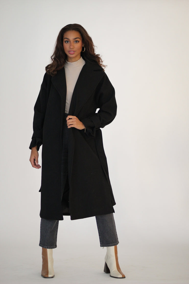 A Girl Wearing a long coat