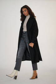 A Girl Wearing a long coat#color_black